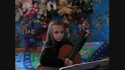 گیتار زدن بچه 8 ساله