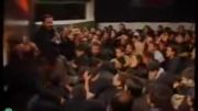 محمود کریمی در حین مداحی موی فرزندش را می کشد و پیراهن او را