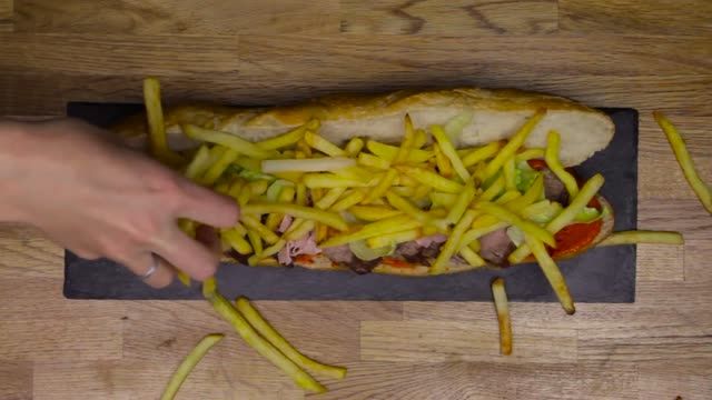 ۱۳ روش مختلف برای تهیه ساندویچ های خوشمزه دنیا-کجارو
