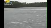 آبتنی مرد روس در دریاچه یخ زده