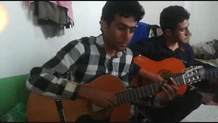 خواندن و گیتار زدن با صدای محمد اسدی