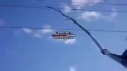 Stupid Dude Touches A Power Line With Stick