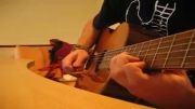 زدن اهنگ فیلم دزدان کاراییب با گیتار(نگاه نکنی نصف عمرت رفته