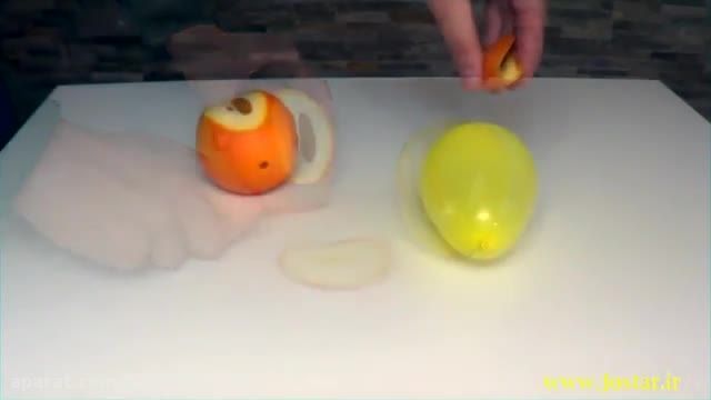 آزمایش ترکیدن بادکنک با پوست پرتقال