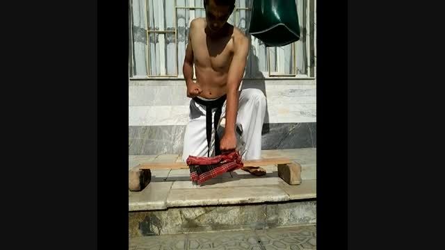 شکستن اجسام سخت توسط قهرمان آسیا محمدرضا اصغری