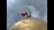 برافراشتن پرچم حرم حضرت زینب توسط مدافعان حرم