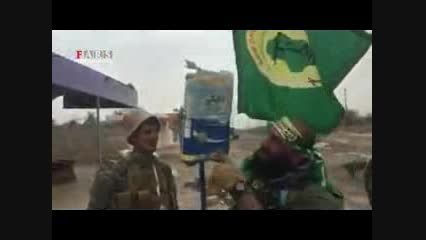 پرچم جدید داعش در دستان ابوعزرائیل