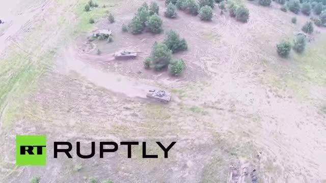 Drone Footage: Newest Russian APCs in full-firing actio