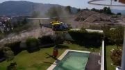 حرکت جالب خلبان هلیکوپتر برای خاموش کردن آتش