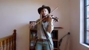 Lara plays the Indiana Jones Theme as Indy (violin)
