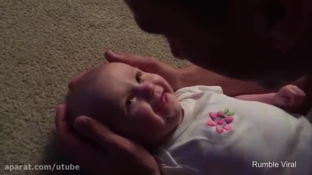 Man sings to his baby daughter