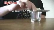 هنر پرتاب کردن سکه داخل لیوان