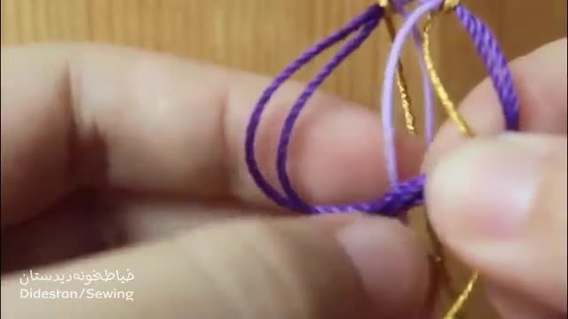  دانلود آموزش تصویری بافت دستبند با نخ با روش ساده 