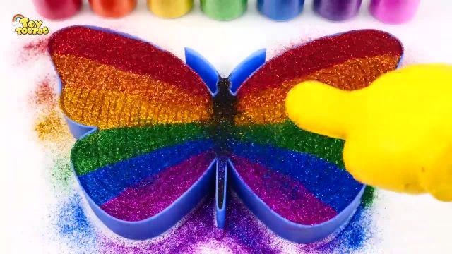 روش بازی با اسلایم به شکل پروانه رنگین کمانی