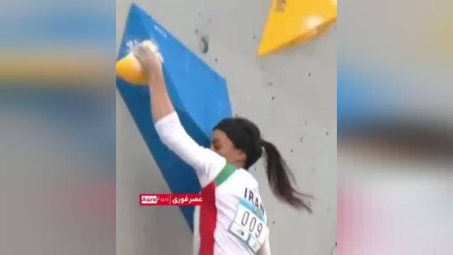 کشف حجاب الناز رکابی با پرچم جمهوری اسلامی ایران در مسابقات سنگ‌نوردی آسیا