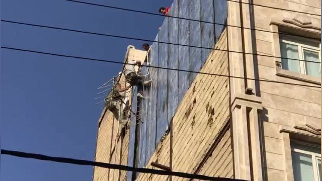  جهان فرود: ایزوگام کردن دیوار ساختمان و نما با طناب در چالوس نوشهر جهان فرود
