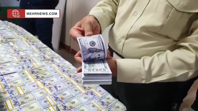 کشف 10 میلیون دلار تقلبی در تهران | ویدیو 