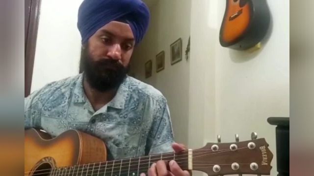 اجرای قطعه مالاگوئنا با تنظیم استاد امیر کریمی توسط نوازنده هندی گیتار آکوستیک