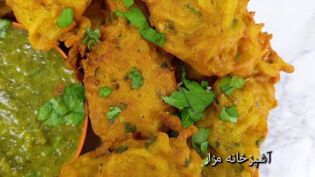 طرز تهیه پکوره کچالو با آرد نخود خوشمزه و عالی غذای معروف افغان ها