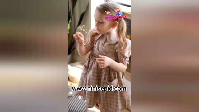 لباس پوشاندن کودک