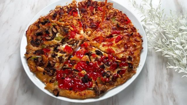 طرز تهیه پیتزا با گوشت مرغ خوشمزه و مخصوص به روش خانگی