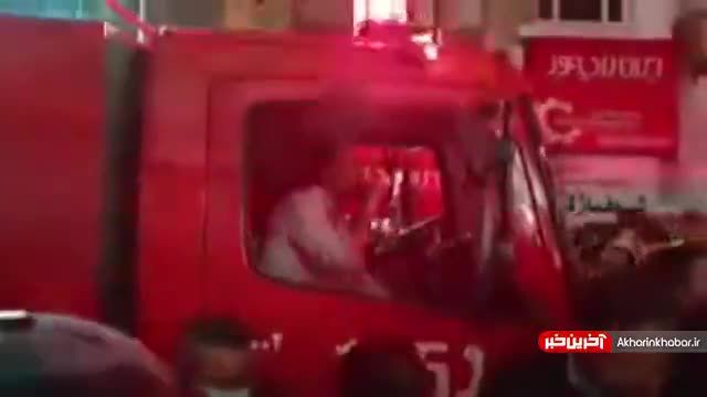 خاموش شدن آتش در ساختمان خیابان بهار تهران پس از 10 ساعت |  ویدیو