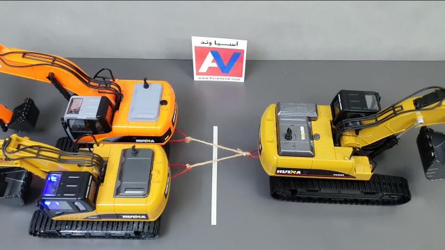 ویدیو دیدنی مسابقه قدرت بیل مکانیکی کنترلی شارژی اسباب بازی آسیاوند