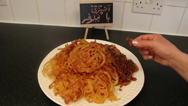 طرز تهیه شیرینی زولبیا ترد و خوشمزه مخصوص ماه رمضان به روش بازاری