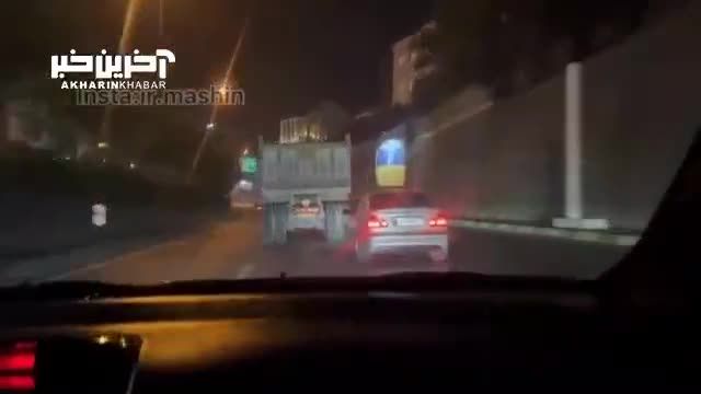 حرکات نمایشی BMW و کامیون در کف بزرگراه‌های تهران