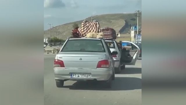 بستن سگ به باربند پراید در جاده نورآباد | ویدیو