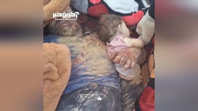 تصاویر پدر فلسطینی که دخترش را در آغوش گرفت و زیر بمباران رژیم اشغالگر به شهادت رسید