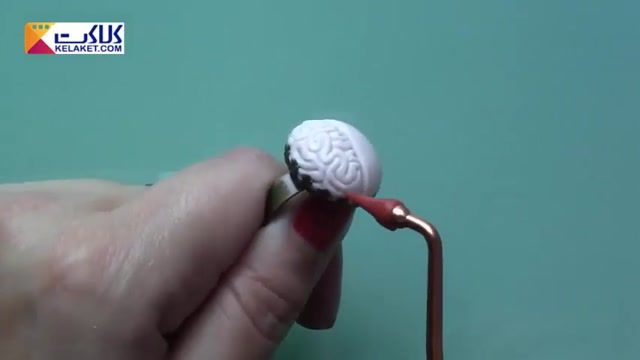 آموزش درست کردن یک انگشتری با نگینی به شکل مغز انسان با استفاده از خمیر پلیمر