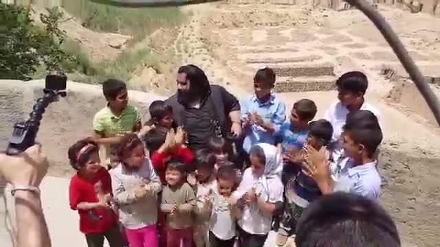 ‫دیدار و اجرای آهنگ رضا صادقی برای کودکان جنوب تهران    Famous Iranian singer sang for poor children‬‎