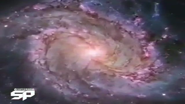 ‫زومی در کهکشان مارپیجی بزرگ درخشان و زیبای M83که در فاصله 12 میلیون سال نوری زمین است .‬‎