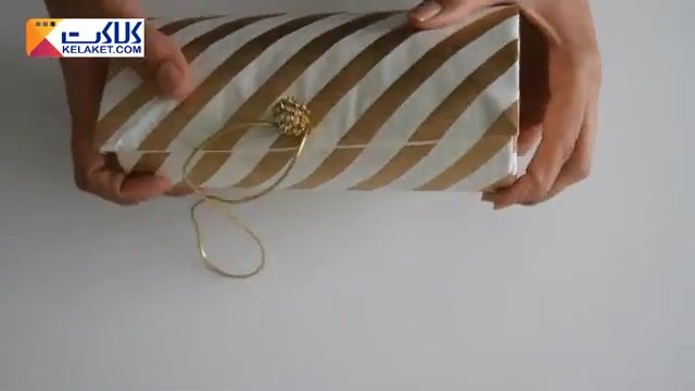 یک ایده خلاقانه برای درست کردن جعبه کادو به شکل یک کیف دستی زنانه