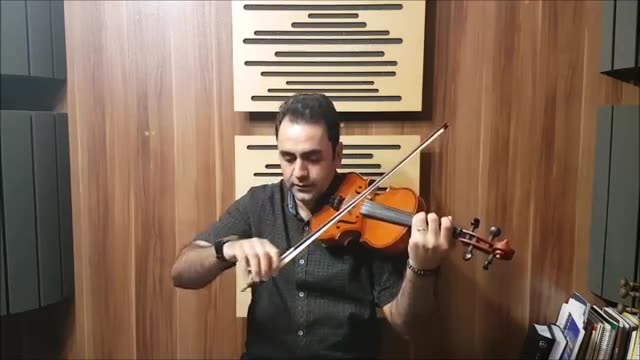 ‫جلد اول تمرین 78و79 ایمان ملکی le violon آموزش ویلن کتاب.mp4‬‎